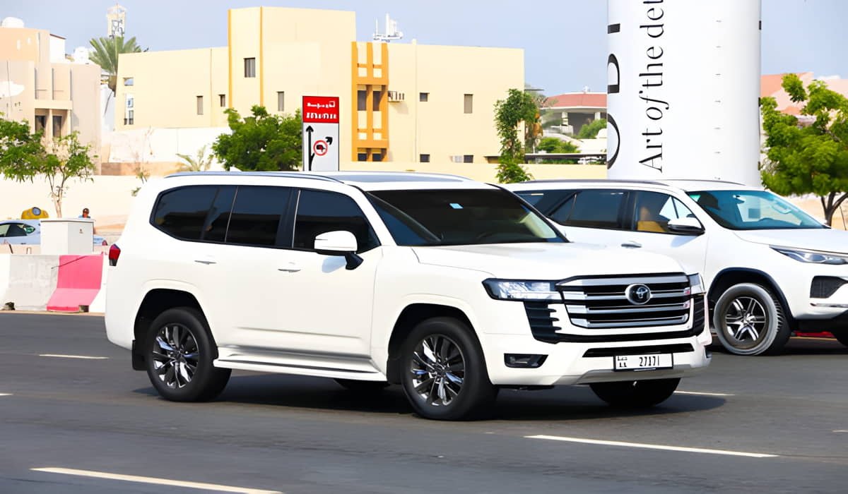 white land cruiser for car lift